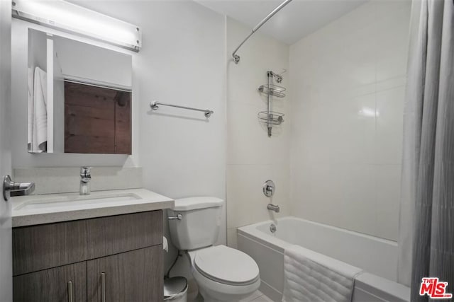 full bathroom with shower / bath combo, toilet, and vanity