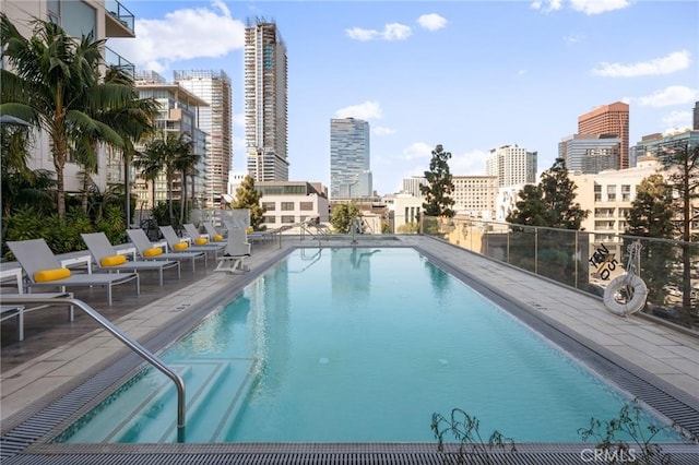 view of pool featuring a patio