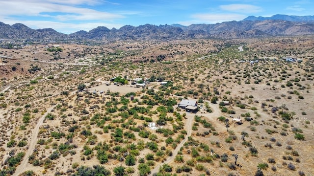 birds eye view of property featuring a mountain view