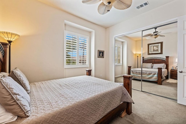 bedroom featuring carpet flooring, a closet, and ceiling fan