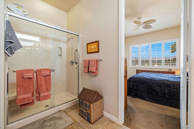 bathroom featuring a shower with shower door, tile patterned floors, and ceiling fan