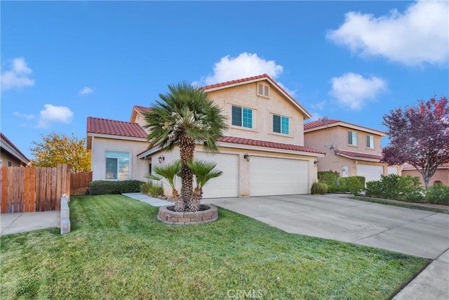 mediterranean / spanish-style house with a garage and a front lawn