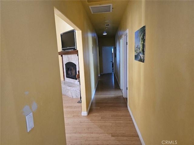 hallway with light wood-type flooring