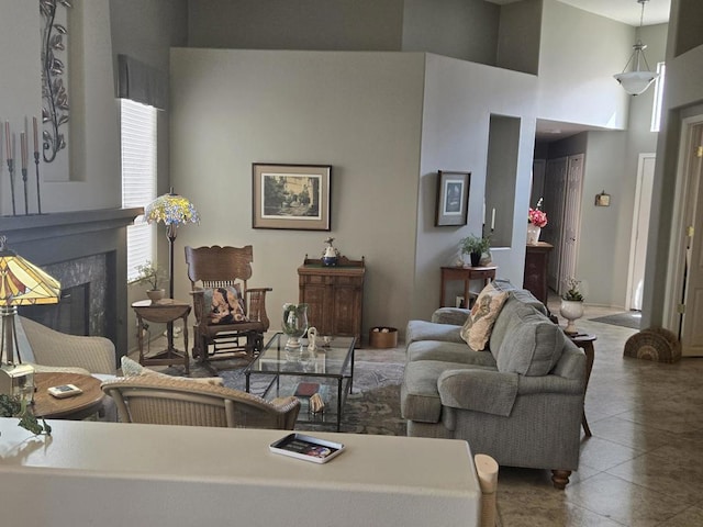 living room featuring a high ceiling