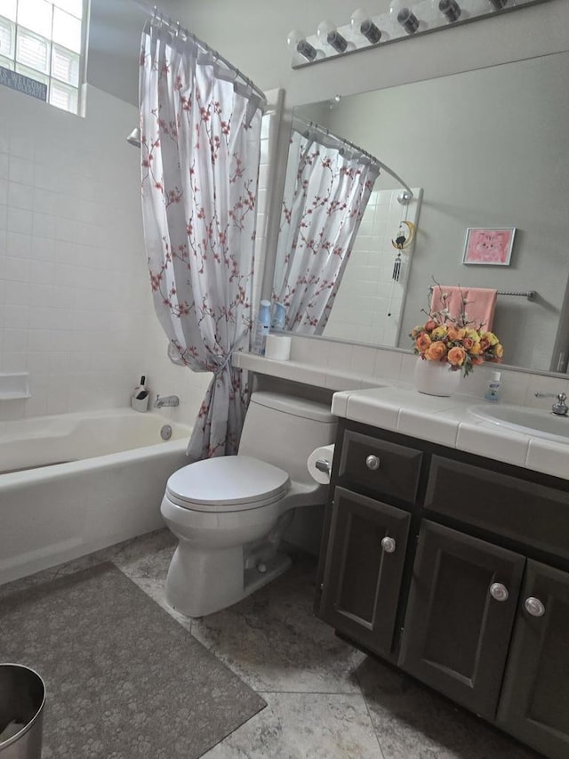 full bathroom with shower / bath combo, toilet, and vanity