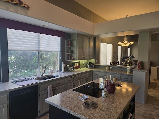 kitchen featuring sink, an inviting chandelier, tile patterned flooring, a kitchen island, and black appliances