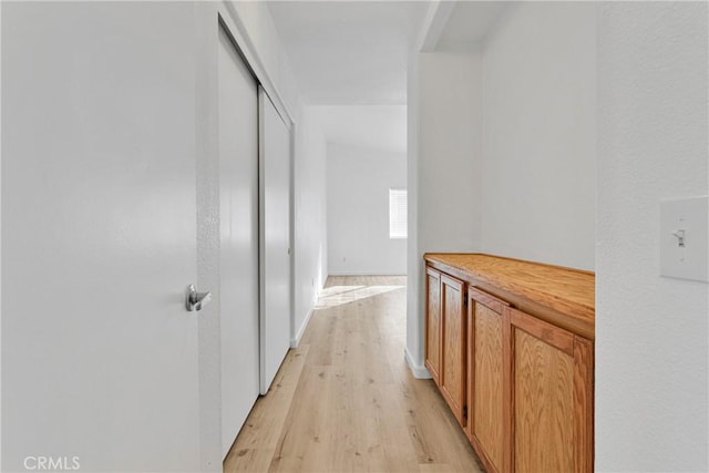 hallway featuring light hardwood / wood-style floors