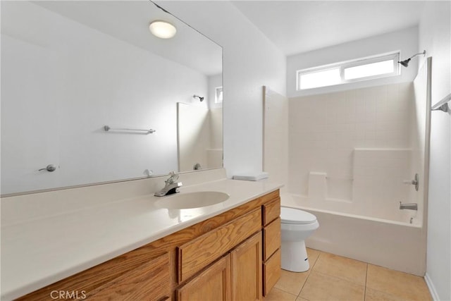 full bathroom featuring tile patterned floors, vanity, toilet, and tub / shower combination