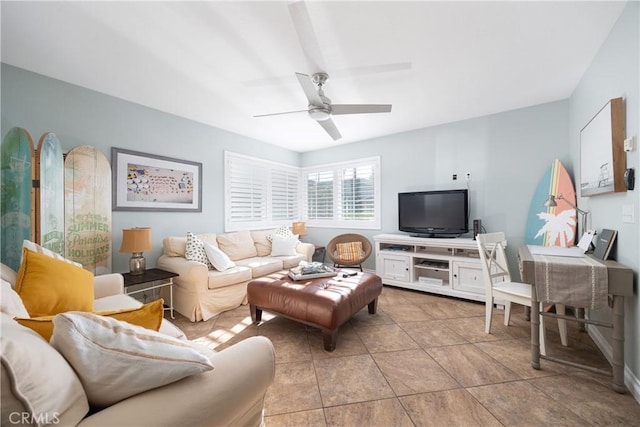 tiled living room featuring ceiling fan