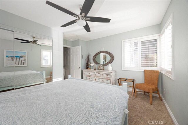 bedroom with carpet and ceiling fan