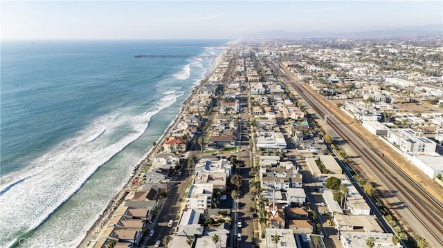 aerial view with a view of the beach and a water view