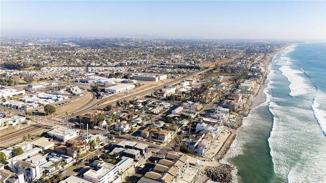 bird's eye view with a view of the beach and a water view