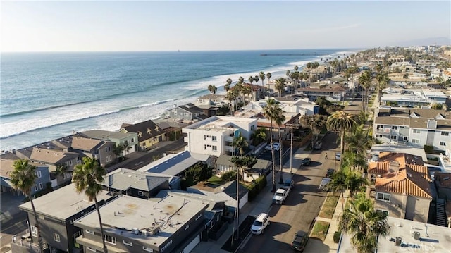 bird's eye view featuring a water view and a view of the beach