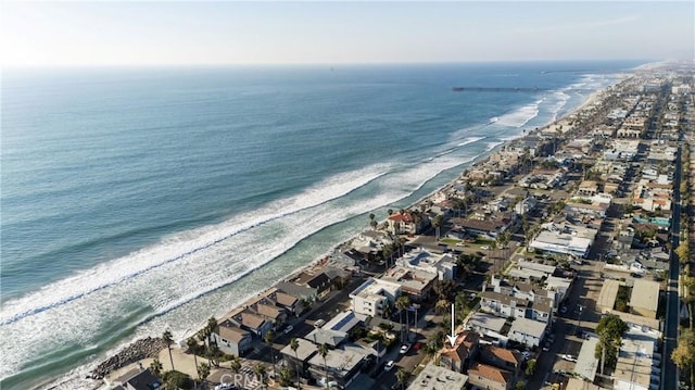 aerial view with a beach view and a water view