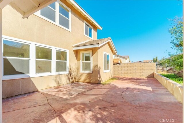 rear view of house with a patio area