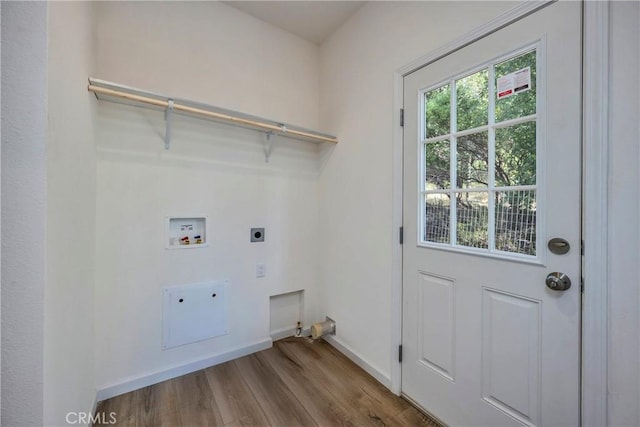 washroom featuring electric dryer hookup, light wood-type flooring, and hookup for a washing machine