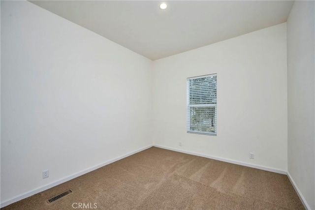 unfurnished room featuring carpet floors