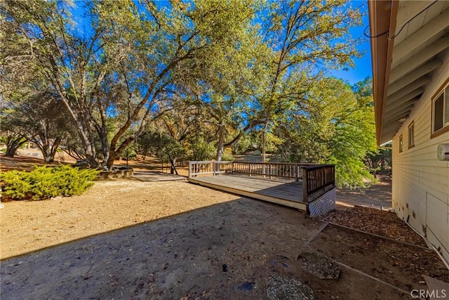 view of yard with a deck