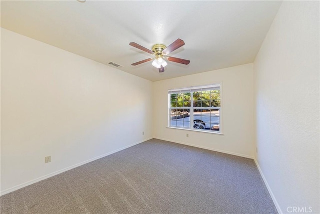 unfurnished room featuring carpet flooring and ceiling fan