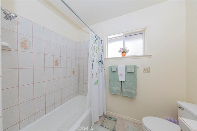 bathroom with tile patterned flooring, toilet, and shower / tub combo with curtain