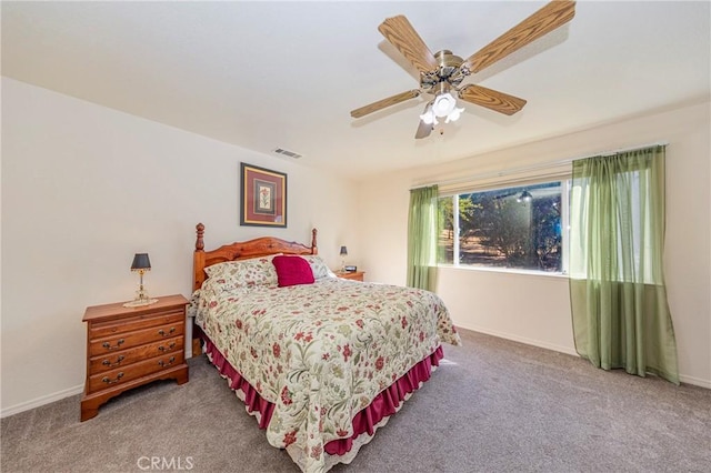 bedroom featuring ceiling fan and carpet floors