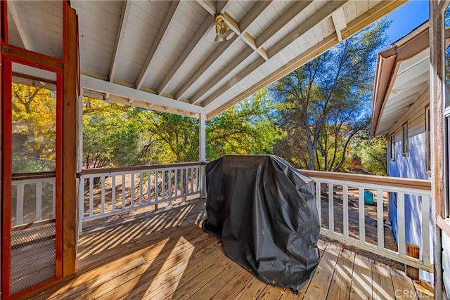 wooden deck with grilling area