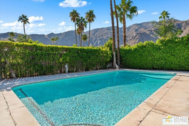 view of pool featuring a mountain view