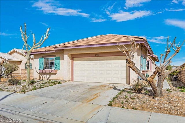 view of front of property with a garage