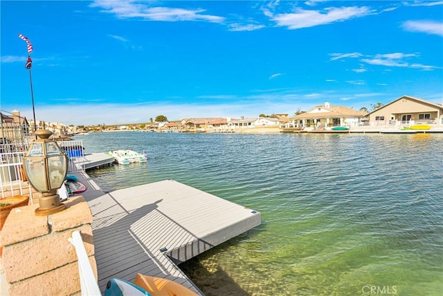 dock area with a water view