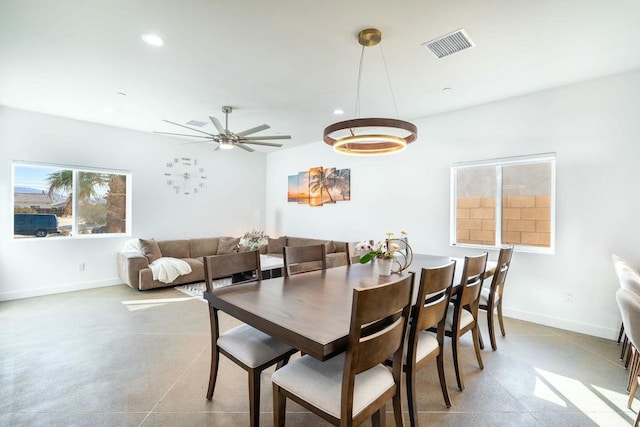 dining room with ceiling fan