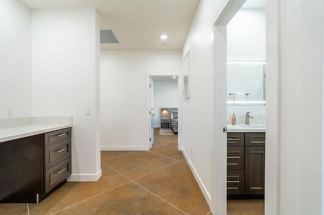 bathroom featuring vanity and tile patterned floors