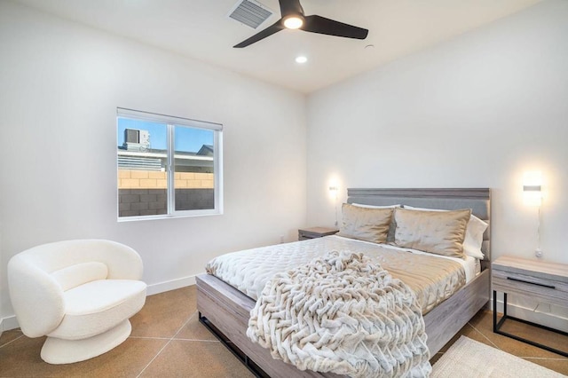 tiled bedroom with ceiling fan