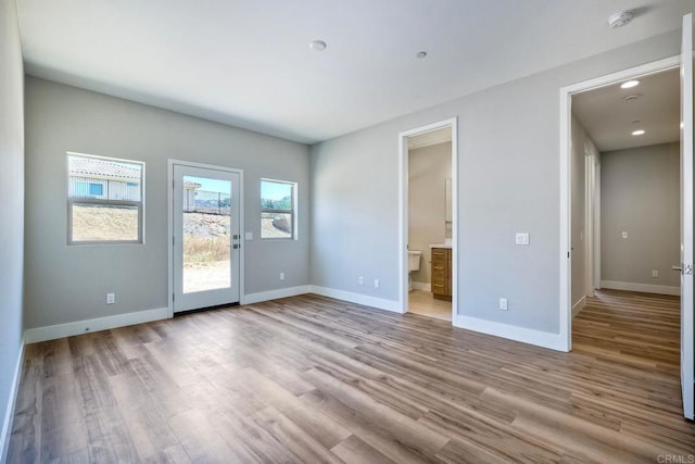 empty room with light wood-type flooring