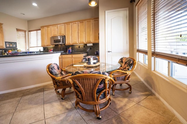 view of tiled dining space