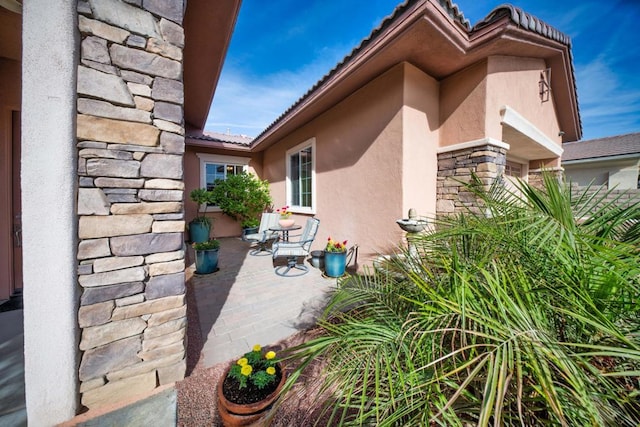 view of home's exterior with a patio area