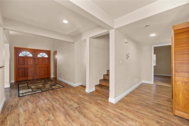 entrance foyer with light hardwood / wood-style flooring