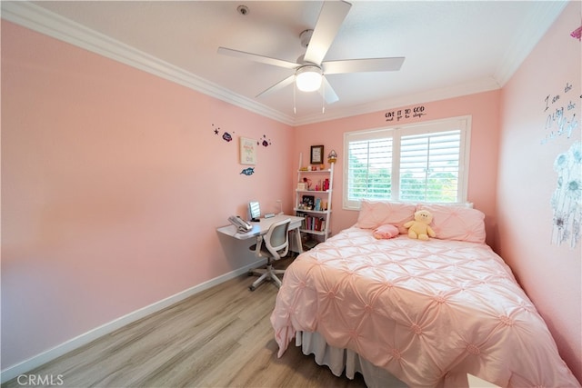 bedroom with ceiling fan, light wood-type flooring, and crown molding