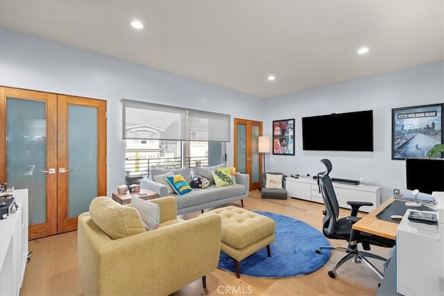 office area featuring french doors and light hardwood / wood-style flooring