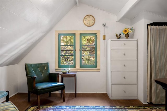 sitting room with vaulted ceiling with beams and dark wood-type flooring