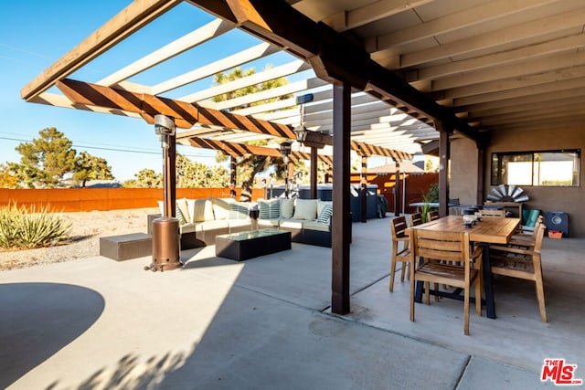 view of patio with a pergola and an outdoor hangout area