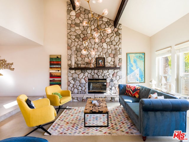 living room with a stone fireplace, beamed ceiling, and high vaulted ceiling