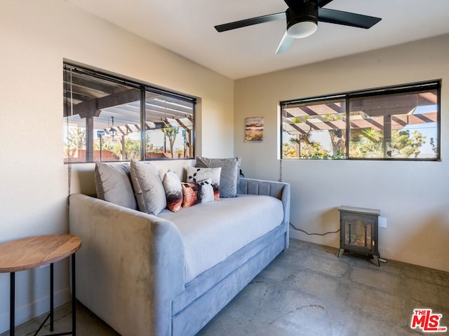 bedroom featuring multiple windows and ceiling fan