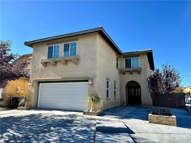 view of front of home with a garage