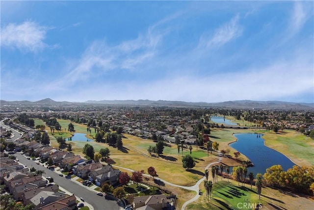 birds eye view of property featuring a water and mountain view