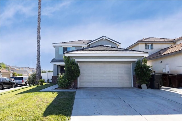 view of front property with a front yard and a garage