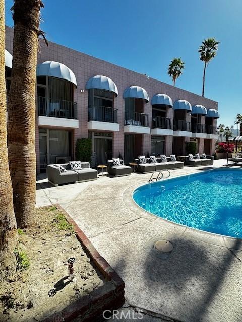 view of pool featuring a patio area and an outdoor hangout area