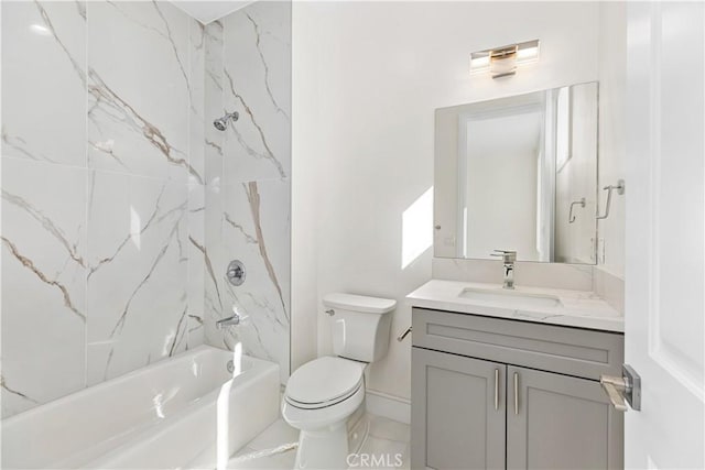 full bathroom with vanity, toilet, and tiled shower / bath