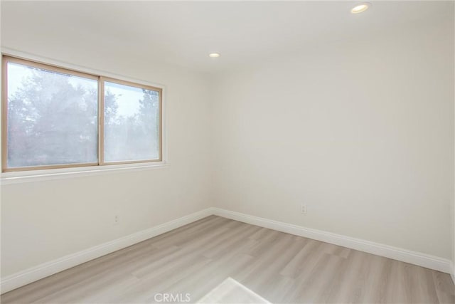 empty room featuring light hardwood / wood-style flooring