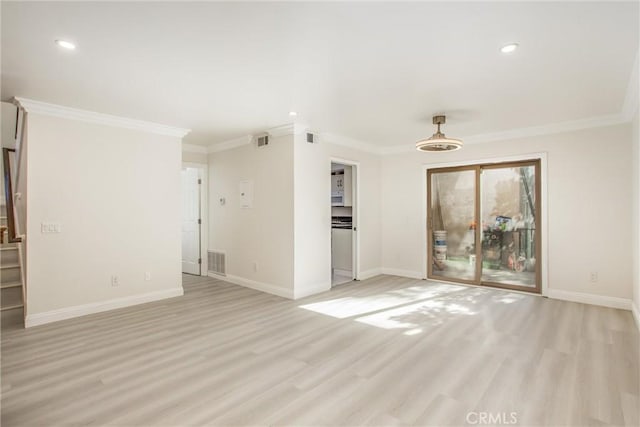 unfurnished room with light wood-type flooring and ornamental molding