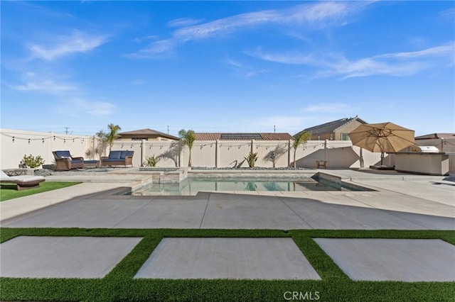 view of swimming pool featuring a patio